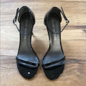 Stuart Weitzman Nudistsong Sandal in Black Patent